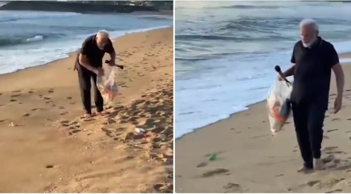 Captan al Primer Ministro de la India recogiendo desechos plásticos en una playa